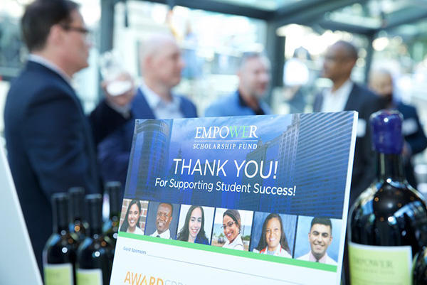A display sign reading "thank you" at an event