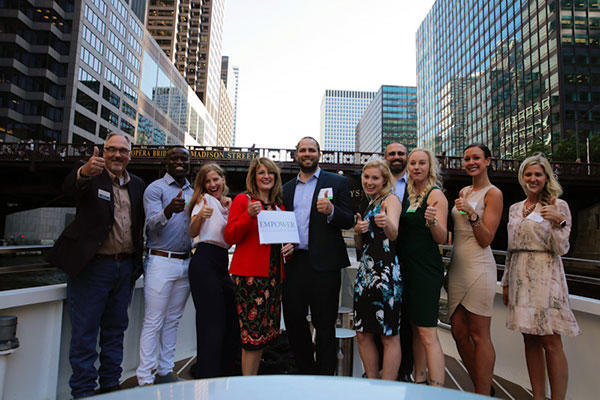 Recipients and board on the river boat deck