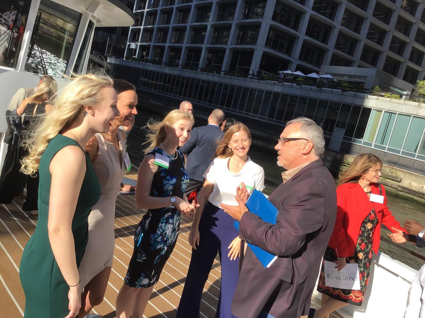 John speaking to students on the boat