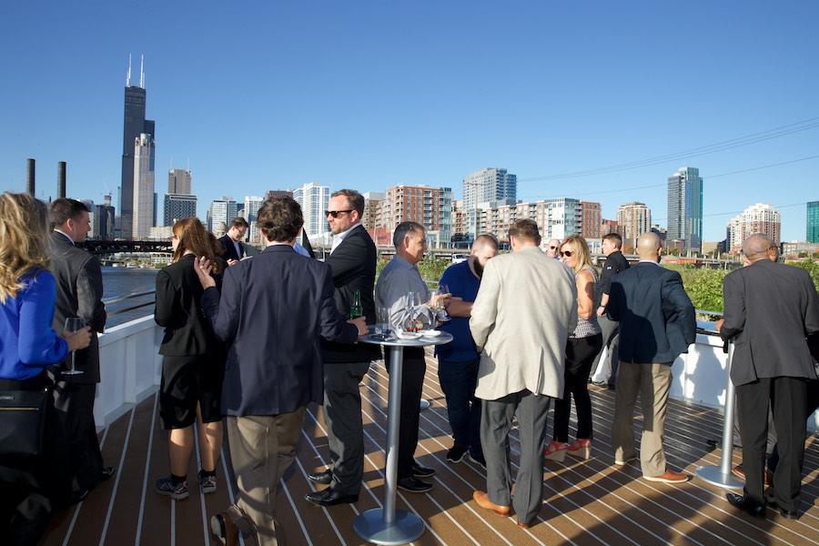 Attendees on the bow of the boat